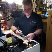 Mike repairing a guitar