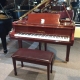 brown grand piano